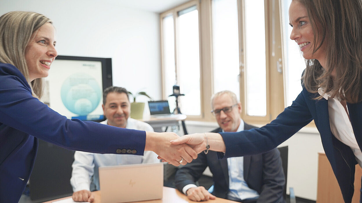 Two people shaking hands